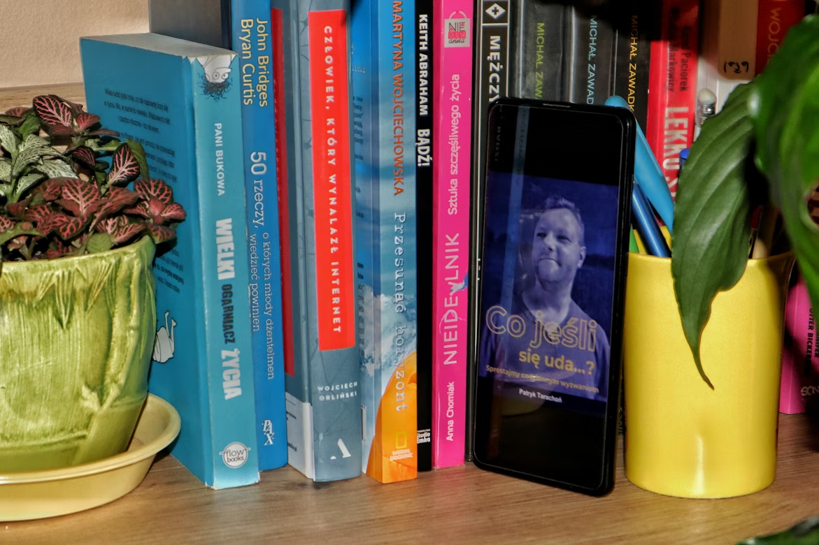 Colorful design books on a shelf